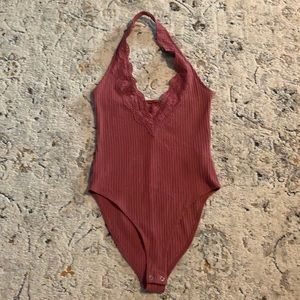 Pink bodysuit with lace